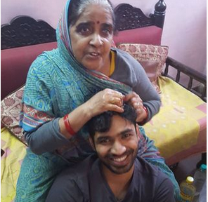 Anupam Tripathi with mother